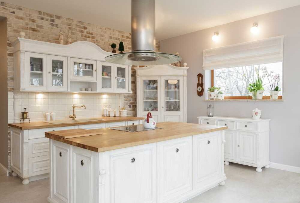Choosing kitchen cabinets to match white floor tiles.